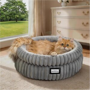 BALANCE washable round cat bed in plush faux fur showing its cozy shape